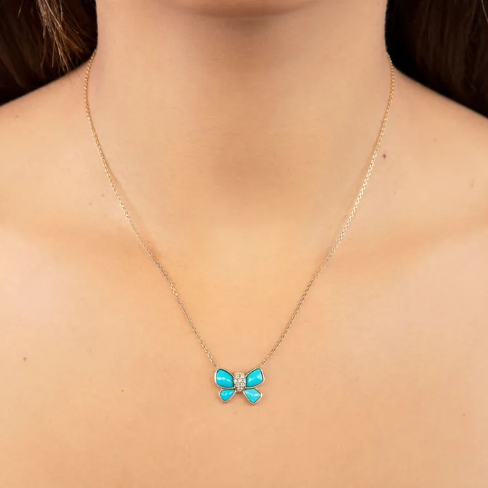The Last Line Hand Carved Bow Necklace