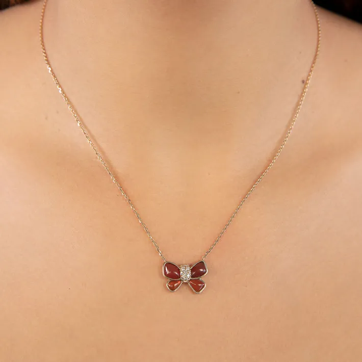 The Last Line Hand Carved Bow Necklace